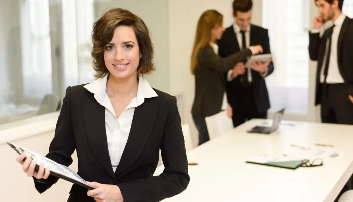 business-woman-with-papers-hands-scaled.jpg