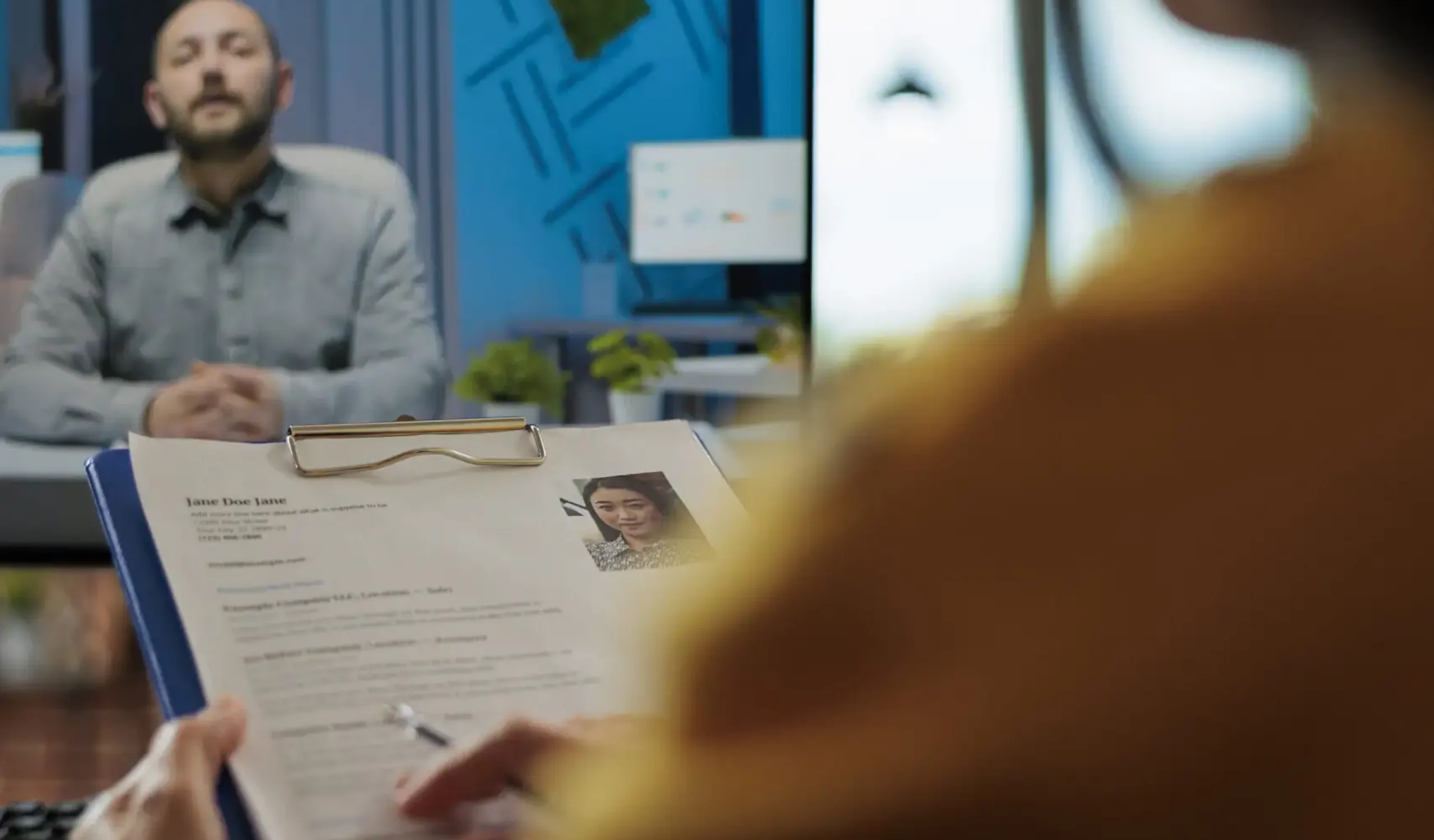 Businesswoman analyzing candidate cv discussing hiring cv with remote man during online videocall meeting. Businesspeople working at company strategy discussing partnership in startup office