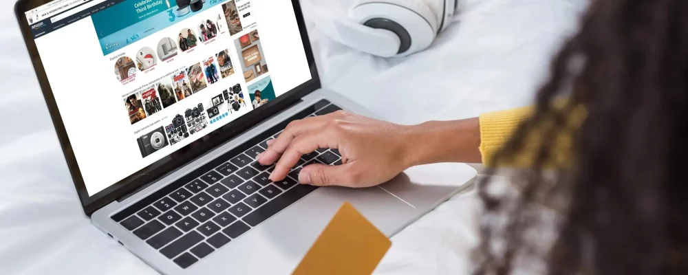 A female scrolling on laptop